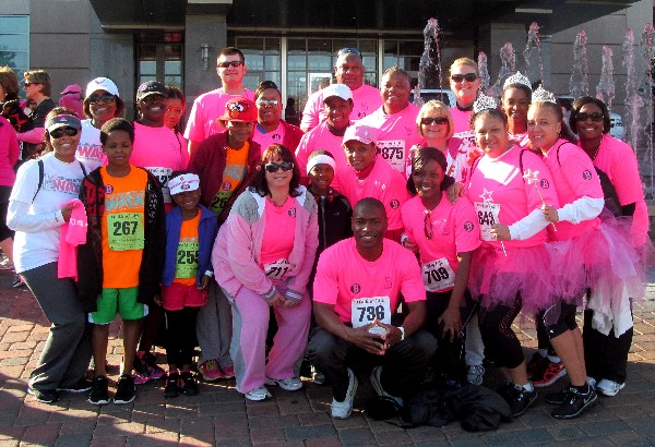 The chapter�s Young AFCEANs huddle together for a group picture before the Walk of Life 5K races held in April to raise money for breast cancer research.